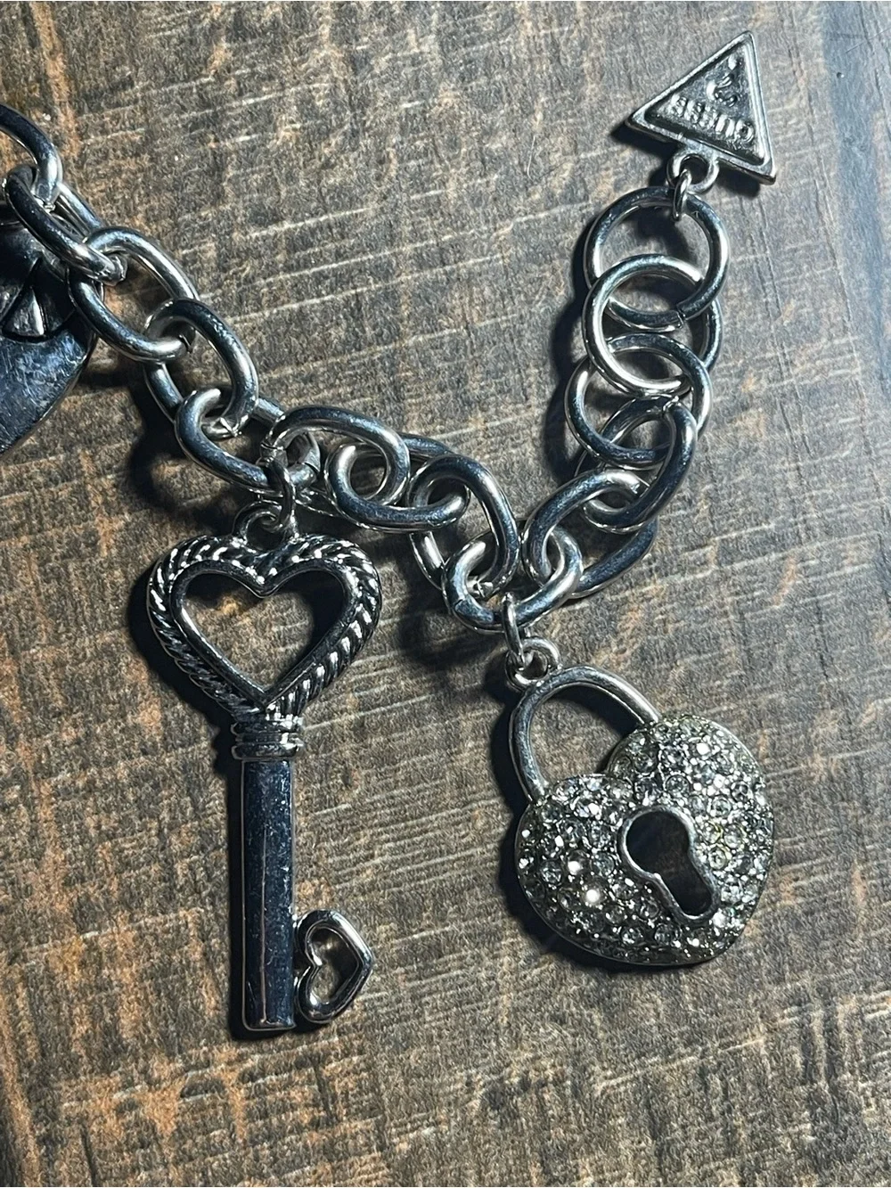 Guess Silver-Tone Charm Bracelet with Heart, Key & Cross Accents